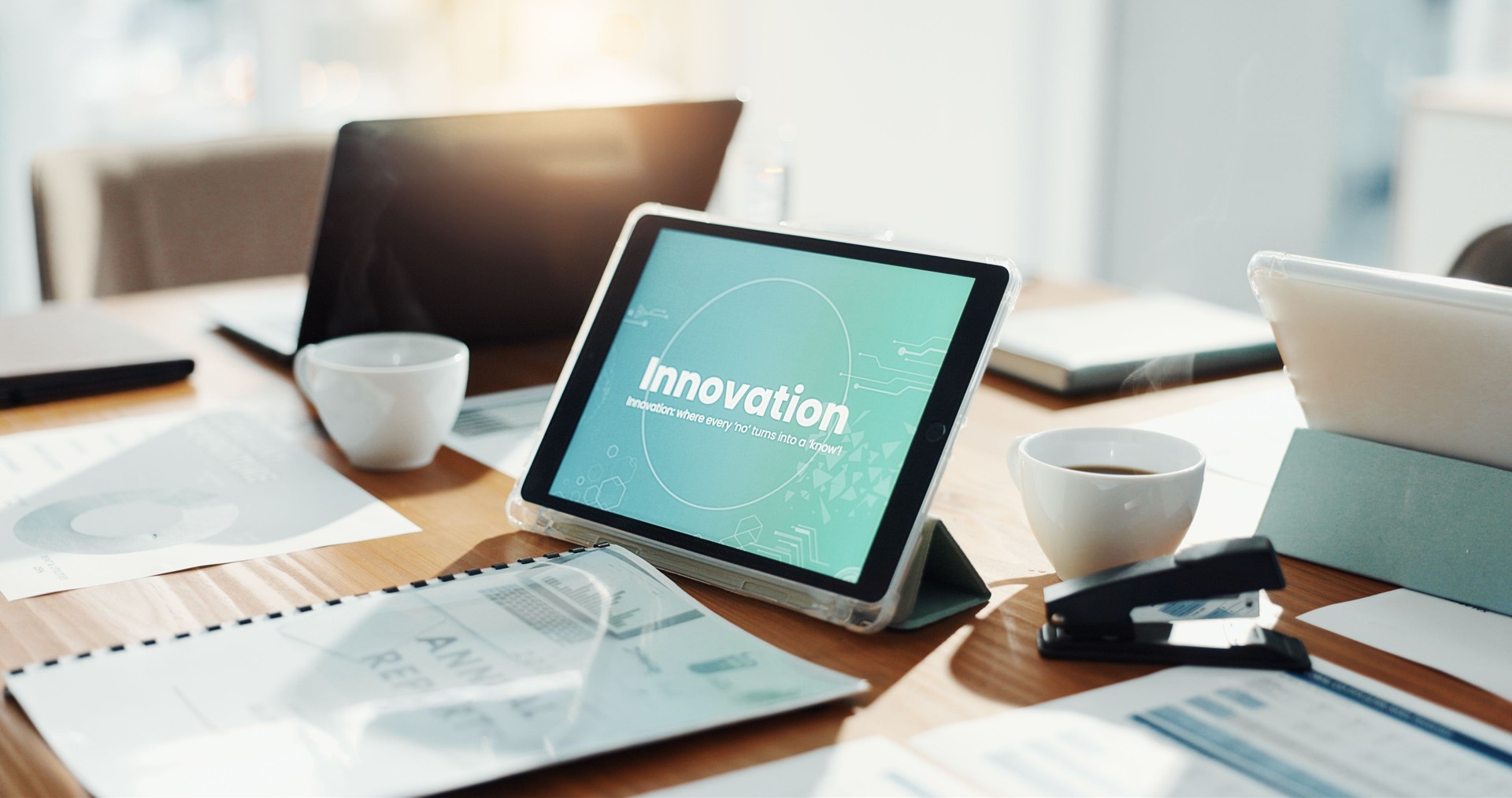 Empty office, tablet and screen for innovation, tech and documents for futuristic web development. Workplace, touchscreen and ui with paperwork for virtual display with application at IT agency