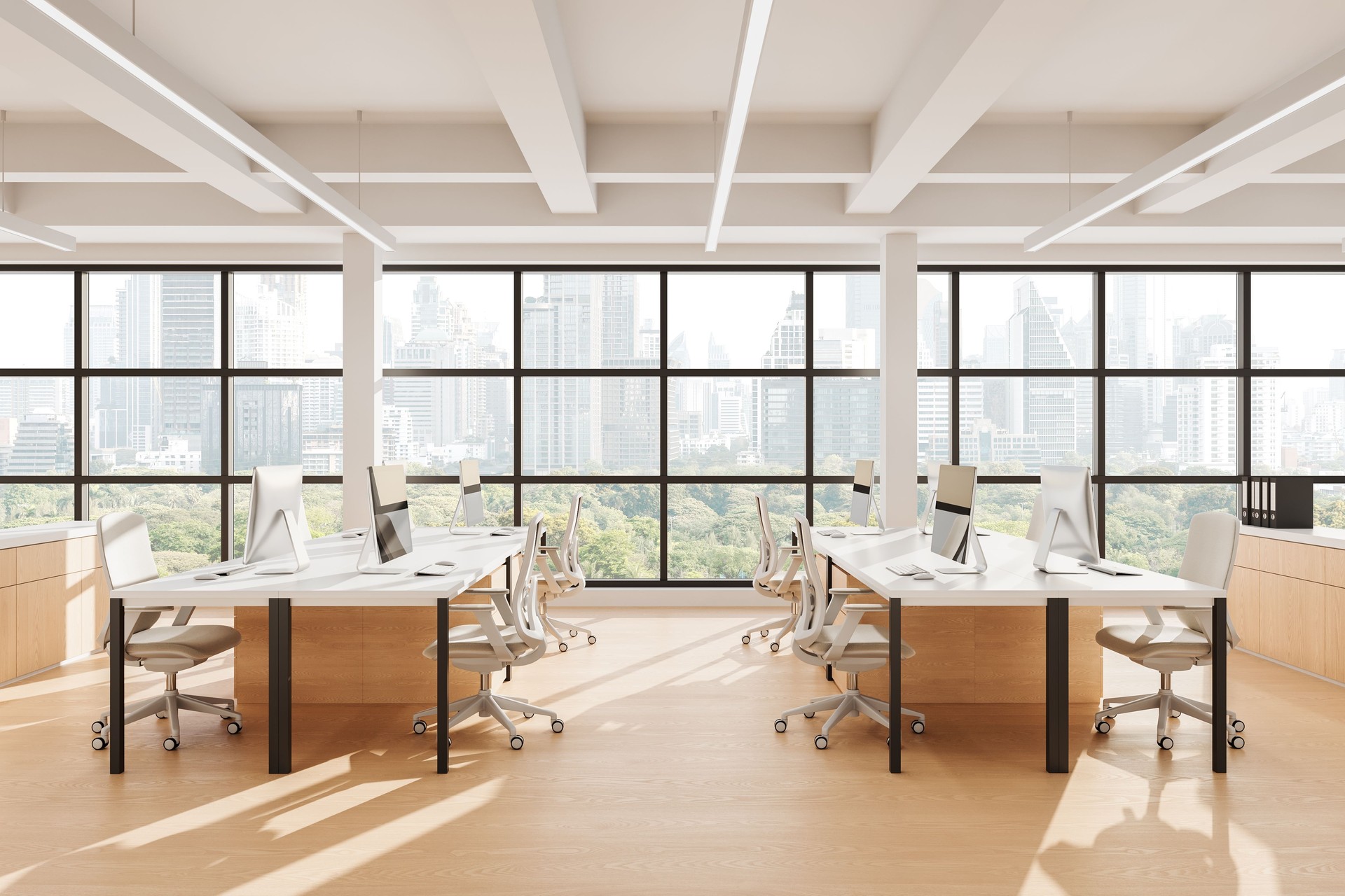 Modern open space office interior with minimalist design, large windows, white desks, and cityscape view in daylight. 3D Rendering. 3D Rendering